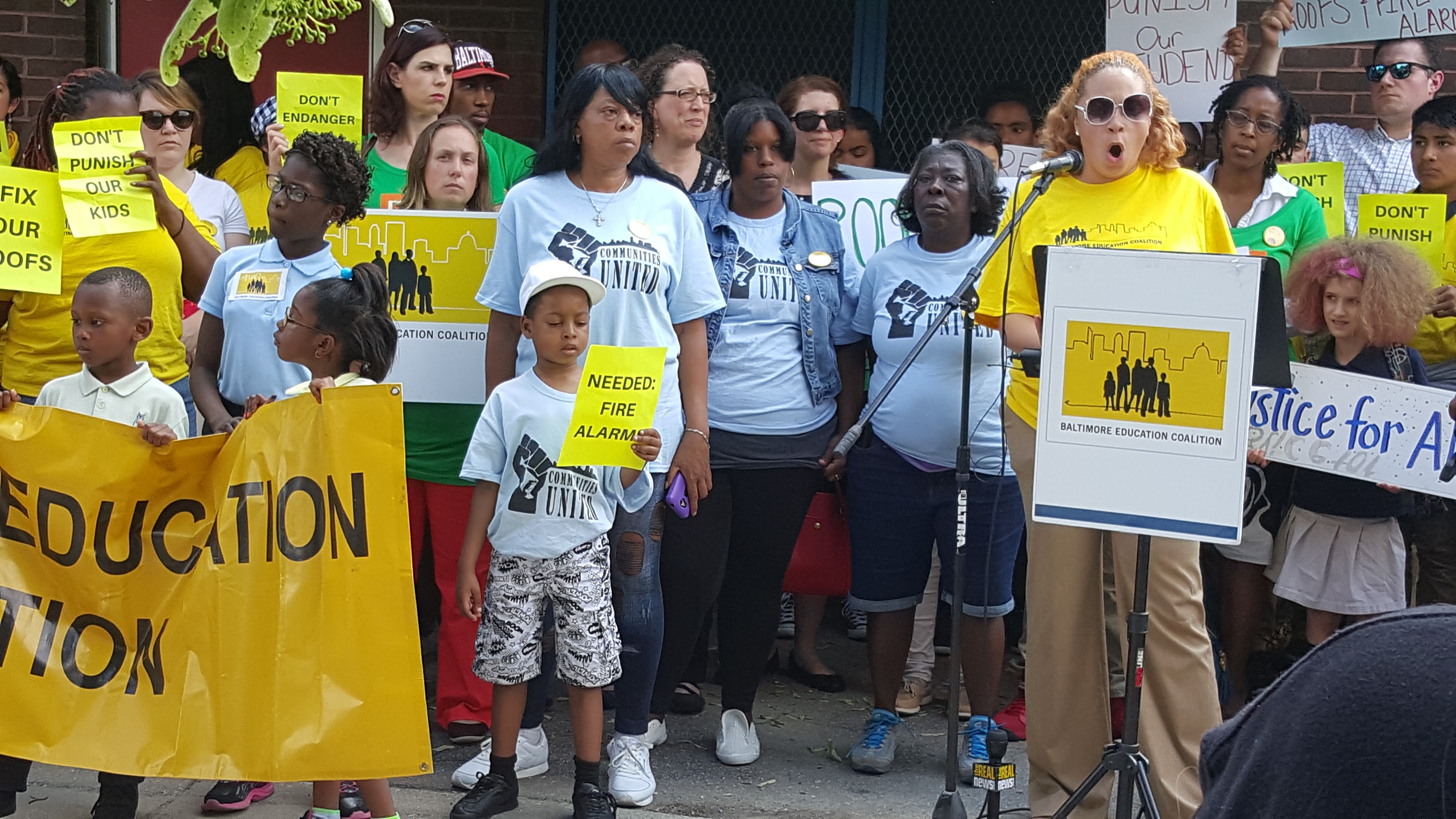 Baltimore Education Coalition protest with community members and children