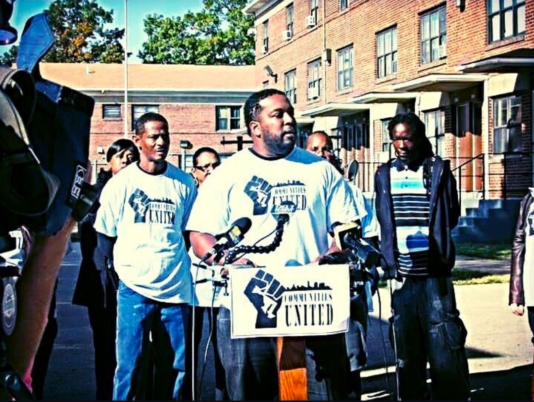 Communities United press conference at outdoor podium
